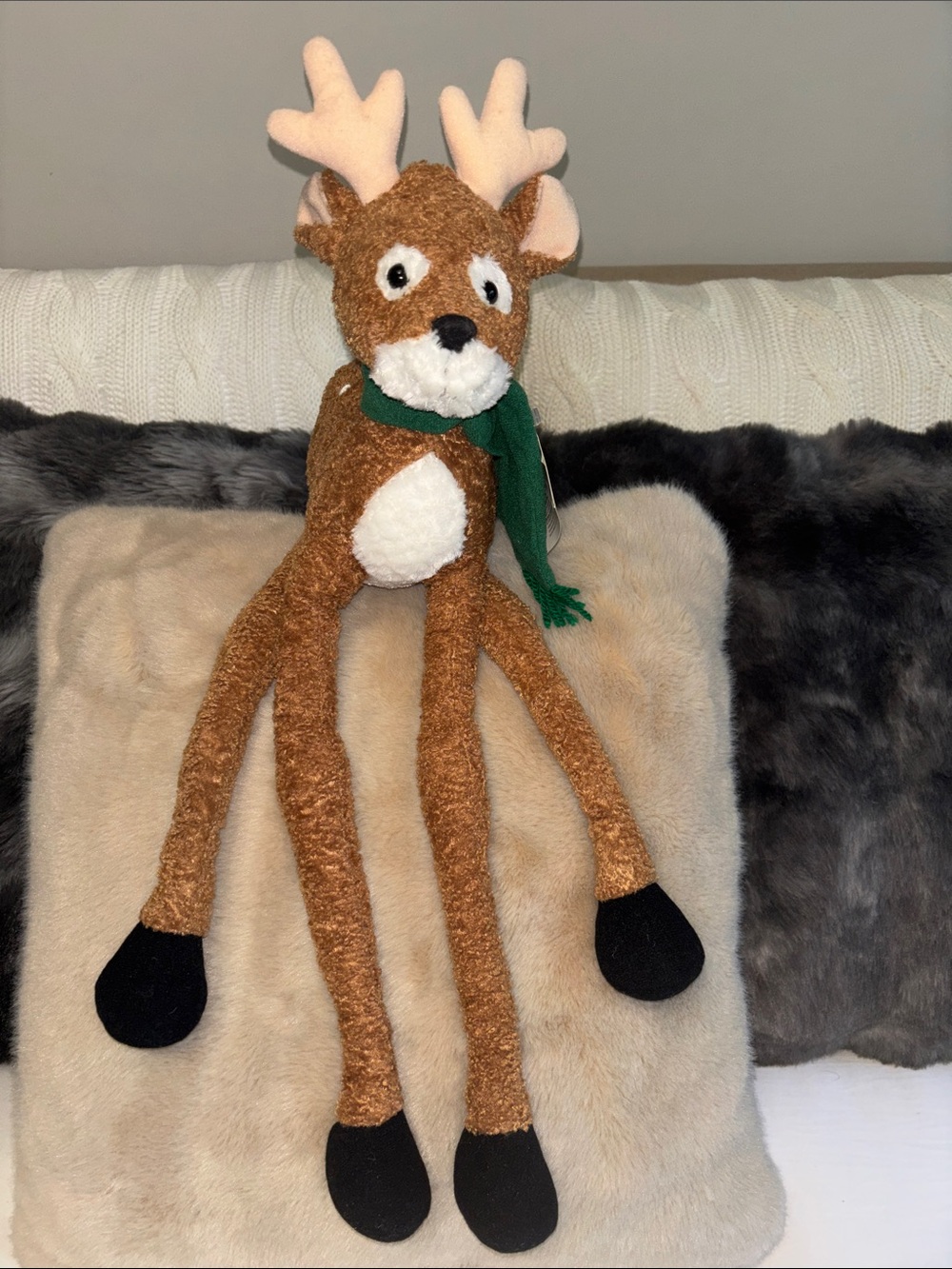 Figi Graphics Crazy LegPlush Reindeer Soft Toy – Brown with Green Scarf